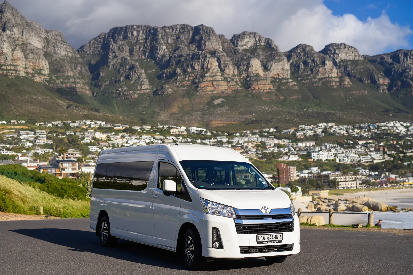 One Day Africa 14-seater Toyota Quantum minibus at Camps Bay, Cape Town